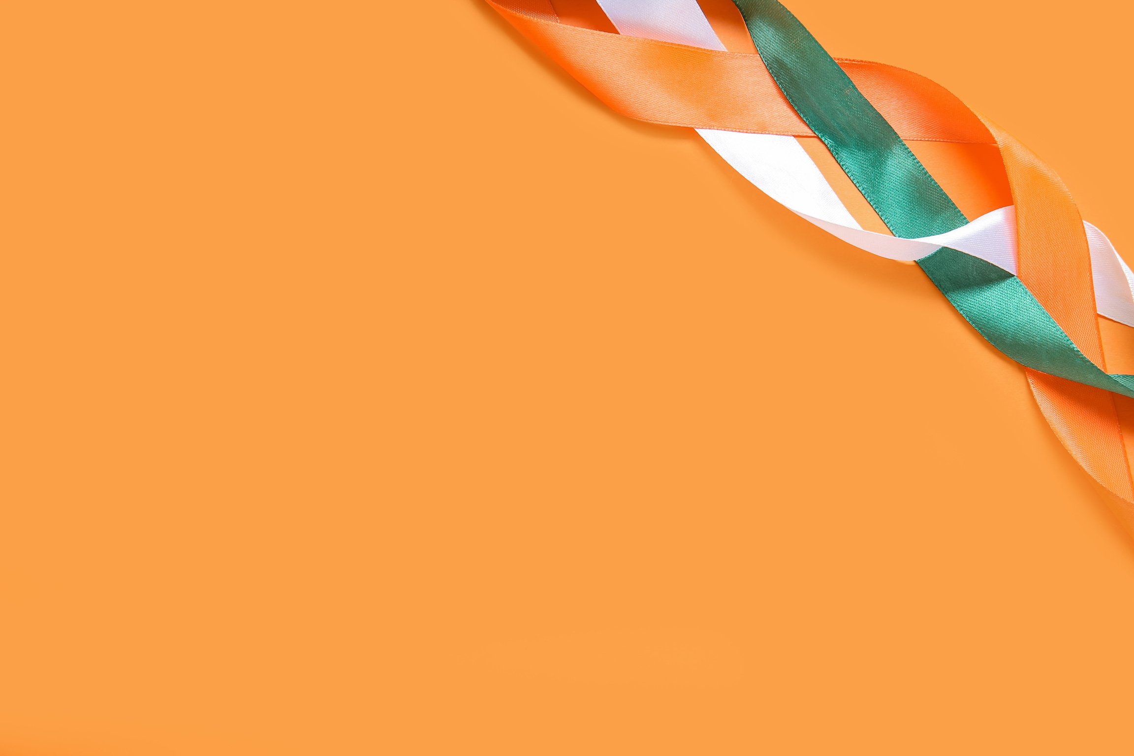 Indian Flag Made of Ribbons on Orange Background